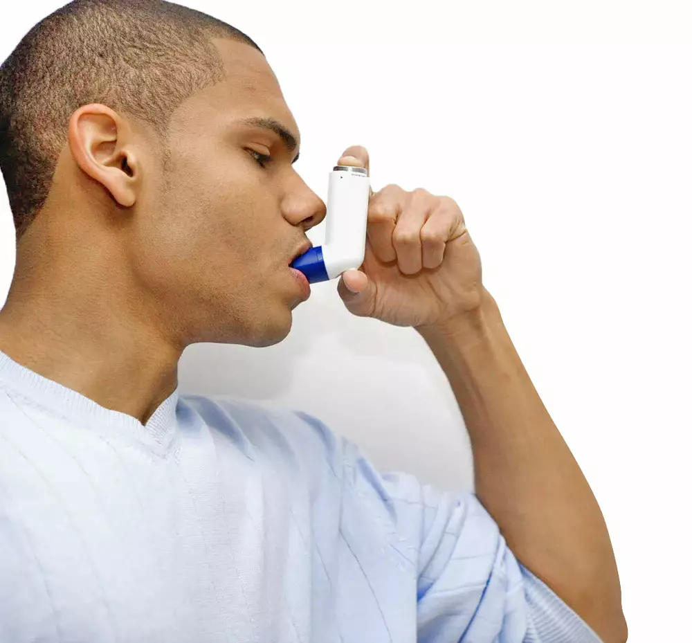 Drug delivery - Man with inhaler